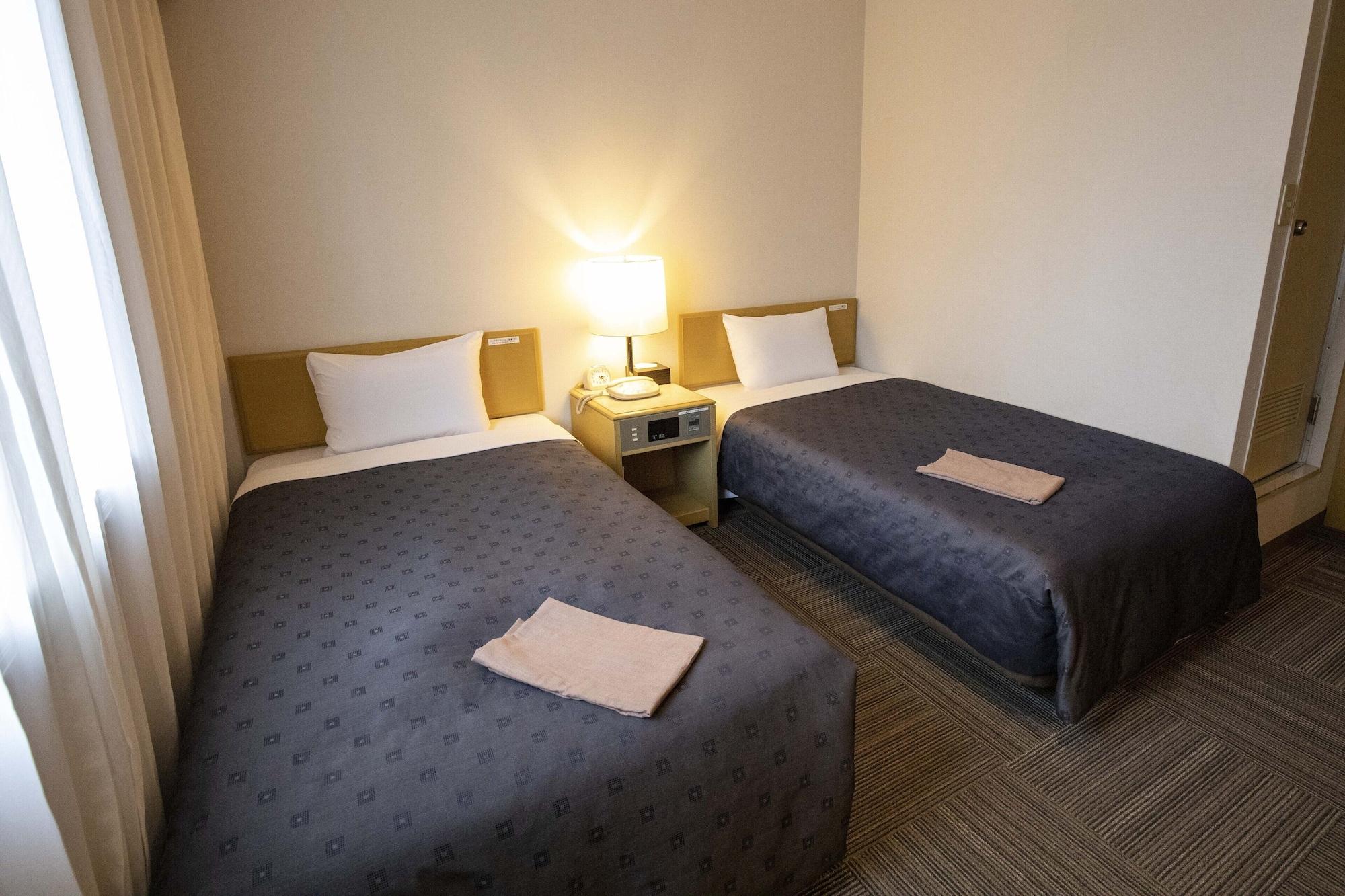 Court Hotel Mito Bagian luar foto